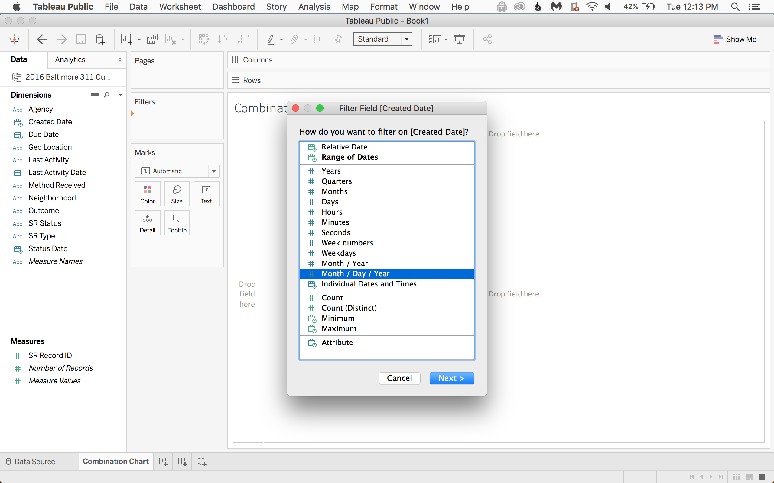 Start by dragging the Created Date to the filter card and choose the specific Month > Day > Year format.